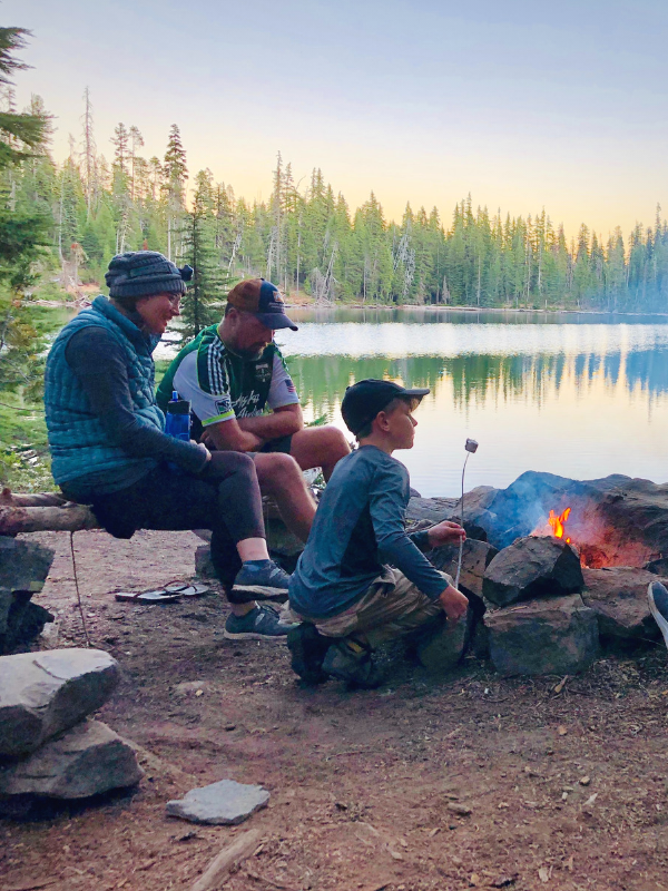 family camping at a lake